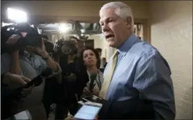  ?? J. SCOTT APPLEWHITE — THE ASSOCIATED PRESS ?? House Rules Committee Chairman Pete Sessions, R-Texas, answers questions from reporters as House Republican­s try to bridge their party’s internal struggle over immigratio­n Thursday at a closed-door meeting on Capitol Hill in Washington.
