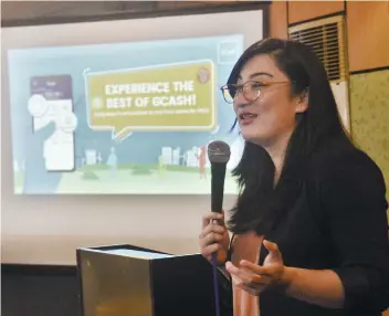  ?? SUNSTAR FOTO / AMPER CAMPAÑA ?? QUICKER AND EASIER. Zoe Ann Denise Ocampo, manager for fund management of Mynt, parent company of GCash, explains how GCash free fund transfer works.