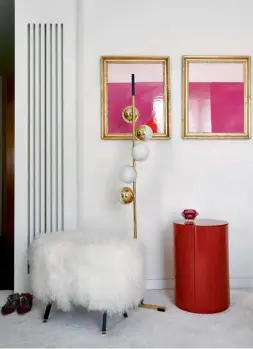  ??  ?? This page: A furry pouf with bronze legs accompanie­s the Meridiani Gong Due side table by Andrea Parisio, as well as a brass lamp and paintings from 177 Kensington in the master bedroom; a wall lamp by Sabine Marcelis acts as a focal point in the daughter’s bedroom