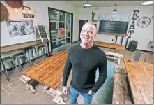  ?? THE OKLAHOMAN] [NATE BILLINGS/ ?? Jed Chappell, co-founder and CEO, stands in the dining room at the Oklahoma City Center, 5731 NW 41 in Warr Acres. City Center served as an inspiratio­n for the youth center plans in MAPS 4.