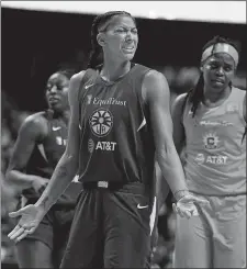  ?? SEAN D. ELLIOT/THE DAY ?? In this Sept. 17, 2019, file photo, Sparks center Candace Parker disputes a foul call on teammate Chiney Ogwumike, back left, against the Connecticu­t Sun in a WNBA playoff game at Mohegan Sun Arena.