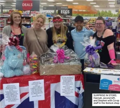  ??  ?? SURPRISE IN STORE: Hannah, second left, and Stephen with Co-op staff in the Ibstock shop