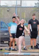  ?? Barbara Hall ?? A Sonoravill­e shot putter lets the metal ball go at the County Line Meet last week at Gordon Central.