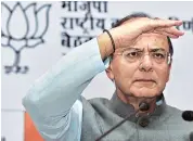  ?? PHOTO: PTI ?? Finance Minister Arun Jaitley briefs the media after the BJP’s national executive meeting at Talkatora stadium in New Delhi on Monday