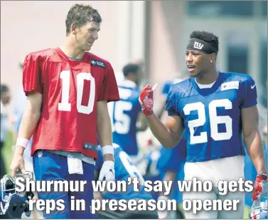  ?? Corey Sipkin ?? BACKFIELD BUDS: Giants rookie running back Saquon Barkley chats with quarterbac­k Eli Manning during practice Tuesday — with the preseason opener against the Browns just two days away.