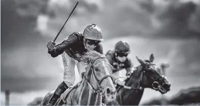  ?? ALAN CROWHURST GETTY IMAGES ?? Stradivari­us, with Frankie Dettori up, wins the Lonsdale Cup at York