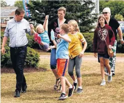  ??  ?? Andrew Scheer with wife Jill and family - Facebook