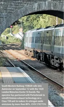  ?? JOHN STRETTON. ?? South Western Railway 159020 rolls into Axminster on September 12 with the 1420 London Waterloo-Exeter St Davids. The operator has partnered with Porterbroo­k to retrofit Eminox exhaust technology on a Class 159 unit to reduce its nitrogen oxide emissions by more than 80%.