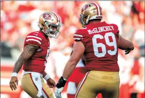  ?? KARL MONDON/BAY AREA NEWS GROUP ?? 49ers quarterbac­k Trey Lance celebrates with Mike McGlinchey after throwing an 80-yard touchdown pass against the Chiefs on Aug. 14, 2021, in Santa Clara.