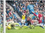  ??  ?? Emerson Hyndman, second right, opens the scoring at Ibrox.