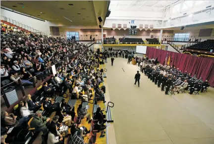  ?? PHOTOS BY LUIS SÁNCHEZ SATURNO/THE NEW MEXICAN ?? The state law enforcemen­t academy graduation ceremony Friday at Santa Fe Indian School.