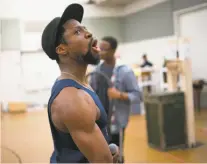  ?? Photos by Robert Caplin / Special to The Chronicle ?? Above: Michael Luwoye, the fifth actor cast in the role, rehearses for “Hamilton.” Right: Jordan Donica (in gray hat) plays Thomas Jefferson with the touring cast.