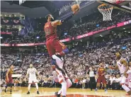  ?? FRANK GUNN/THE CANADIAN PRESS VIA AP ?? Cavaliers forward LeBron James shoots against the Raptors during Game 2 of a second-round playoff series Thursday in Toronto.