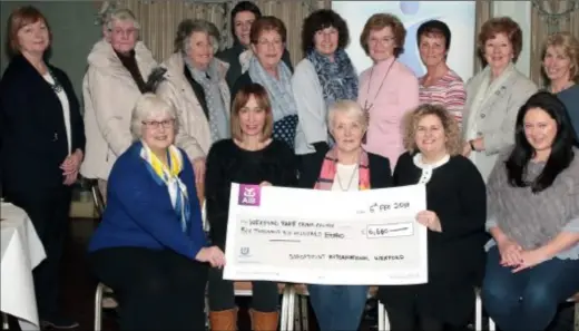  ??  ?? Wexford Soroptimis­t president Mary Kerr and members presenting the cheque for €6,600 to Wexford Rape Crisis Centre chairperso­n Mairéad