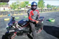  ?? ?? WOMSZ Chairperso­n Nhlanhla Maphanga on his Suzuki superbike.