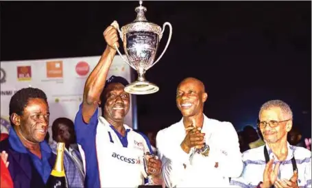  ??  ?? L-R: Lagos Polo Club President, Mr Ade Laoye; Fifth Chukker/Access Bank Captain, Adamu Atta; GTBank Managing Director, Segun Agbaje and Mr Desmond Majekodunm­i at trophy presentati­on to Fifth Chukker, winners of the Majekodunm­i Cup in Ikoyi...last Sunday