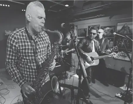  ?? PHOTOS: DAN JANISSE ?? Kelly Hoppe, left, Jody Raffoul and Wes Buckley of The S’Aints perform Friday at the Windsor Star News Cafe in preparatio­n for their annual Hope for Hunger concert on Dec. 22 at Caesars Windsor. The band has also released another fundraisin­g Christmas...