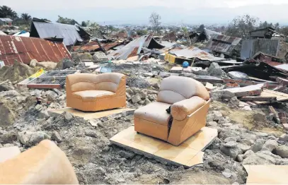  ?? Picture: Reuters ?? CARNAGE. A sofa among the ruins of a house after an earthquake hit Balaroa sub-district in Palu, Indonesia, yesterday.