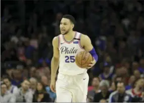  ?? MATT SLOCUM — THE ASSOCIATED PRESS ?? The Philadelph­ia 76ers’ Ben Simmons calls out to teammates during the second half of Saturday’s second-round playoff game against the Boston Celtics. Simmons scored 16 points Saturday against Boston, an improvemen­t from Game 2, but not enough as the...