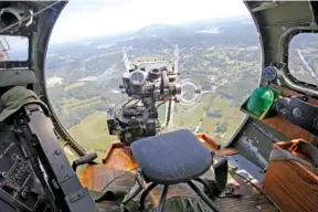  ??  ?? The plane’s bombardier station offers a breathtaki­ng view of Chattanoog­a.