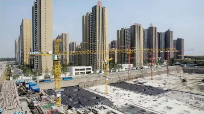  ??  ?? BEIJING: A general view shows a constructi­on site on the outskirts of Beijing. — AFP