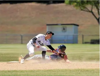  ?? Photo: Kevin Farmer ?? CLOSE CALL: Toowoomba Rangers player Lewis Codd slides safely into second base under the glove of All Stars Sura Choi.