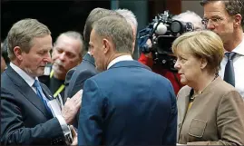  ??  ?? Key talks: Enda Kenny, Donald Tusk and Angela Merkel yesterday