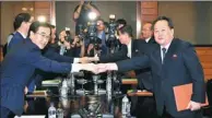  ?? YONHAP NEWS AGENCY ?? The Republic of Korea’s Unificatio­n Minister Cho Myoung-gyon (left) shakes hands with his Democratic People’s Republic of Korea counterpar­t Ri Son-gwon after their meeting on the DPRK side of the border village of Panmunjom on Monday.