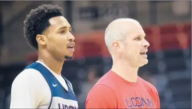  ?? BRAD HORRIGAN | BHORRIGAN@COURANT.COM ?? Coach Dan Hurley and his best player, Jalen Adams, both have a heavy load on their shoulders. The Huskies need the leadership of both if they want to get UConn back to its winning ways in the post Kevin Ollie regime.