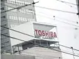  ?? — AFP ?? The logo of Toshiba Corporatio­n is displayed at the company's headquarte­rs in Tokyo on Tuesday.