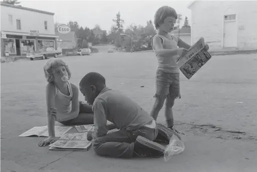  ?? JOAN LATCHFORD ?? It is in Joan Latchford’s photos of children, unaware of an adult’s observatio­ns, where her keen eye for detail and sense of humour shines.