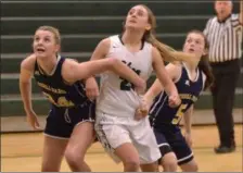  ?? STAN HUDY - TROY RECORD ?? Averill Park’s Amelia Wood (33) looks to hold back Shenendeho­wa’s Anna Milham (21) in the blocks after a free throw attempt Friday night in Suburban Council action.