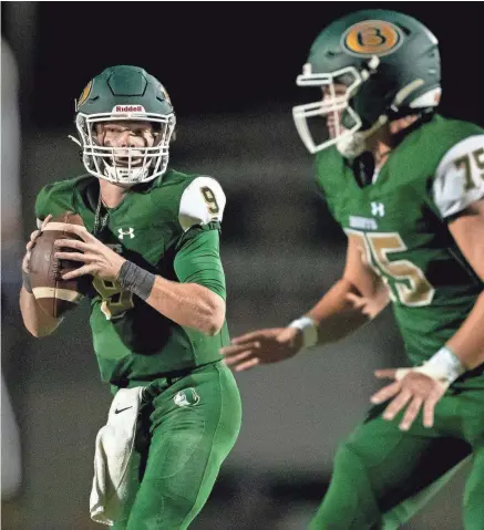  ?? MAX GERSH / THE COMMERCIAL APPEAL ?? Briarcrest quarterbac­k Michael Dallas (8) looks for an open receiver Friday, Sept. 18, 2020, during a game against St. Benedict at Briarcrest Christian School in Eads.