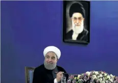  ?? VAHID SALEMI/THE ASSOCIATED PRESS ?? Iranian President Hassan Rouhani concludes his press conference in Tehran, Iran, Monday. Iran’s newly re-elected President Hassan Rouhani on Monday called relations with the United States “a curvy road,” saying he hoped the Trump administra­tion will...