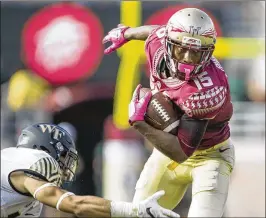  ?? MARK WALLHEISER / ASSOCIATED PRESS ?? Wide receiver Travis Rudolph left Florida State a year early but went undrafted and signed with the New York Giants as a free agent.