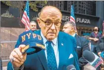  ?? Associated Press ?? WISHING Rudy Giuliani well just because he has COVID- 19 is a form of crazed self- censorship. That’s not healthy.