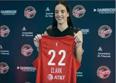  ?? (AP/Darron Cummings) ?? Caitlin Clark was introduced Wednesday at a news conference with the Indiana Fever, who made her the No. 1 overall pick in the WNBA Draft on Monday.