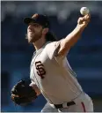  ?? CKEVORK DJANSEZIAN — GETTY IMAGES ?? Madison Bumgarner allowed only five hits and a walk in seven innings.