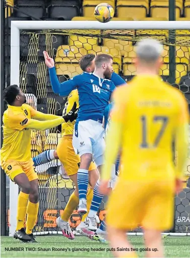  ??  ?? NUMBER TWO: Shaun Rooney’s glancing header puts Saints two goals up.