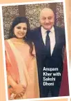  ??  ?? Anupam Kher with Sakshi Dhoni