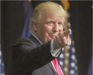  ?? PHOTO BY JAKE DANNA STEVENS/THE TIMES AND TRIBUNE VIA AP ?? PENNSYLVAN­IA POLKA: Donald Trump points to the crowd after speaking during a rally in Scranton, Pa.