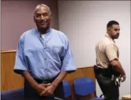  ?? JASON BEAN — THE RENO GAZETTE-JOURNAL VIA AP, FILE ?? In this file photo, former NFL football star O.J. Simpson enters for his parole hearing at the Lovelock Correction­al Center in Lovelock, Nev.