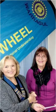 ??  ?? Warragul Inner Wheel president Nasia Sahhar presents a cheque to Baw Baw Food Relief manager Anne Pascoe.
