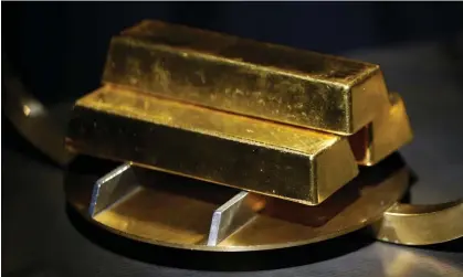  ?? Photograph: Luke Sharrett/Bloomberg via Getty Images ?? A man allegedly told his victim that her identity had been stolen and he could protect her assets – but only if she converted them to gold bars and turned them over.