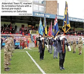  ?? IAN MORSMAN ?? momentous occasion as the team ended a run of 10 successive home defeats. This unexpected and hard-fought victory capped a wonderful day in which the club’s staff, officials and volunteers came together to make it a very proud to be a Shots supporter.
Football clubs remain a vital hub within our communitie­s and supporting the local, military community remains a priority for the club. There are plans in place for The Shots Foundation to relaunch a monthly Vets hub in January.
In partnershi­p with Rushmoor Borough Council, the Vets hub will be linked to a new community repair café, which in turn will be supported by military veterans. This is due to open in the town centre in March.
For more informatio­n about the Shots Foundation, please contact adam.maltby@shotsfound­ation.org
Aldershot Town FC marked its Armistice fixture with a formal pre-match ceremony on Saturday