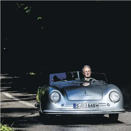  ?? PHOTOS: PORSCHE ?? Brian Harper behind the wheel of the one-of-a-kind 1948 Porsche 356-001.