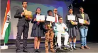  ??  ?? Students from various schools in Dubai with Vipul after receiving the Pravasi Bharatiya Children’s Prize for outstandin­g achievemen­ts in academics and co-curricular activities.
