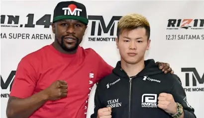  ?? AFP ?? Floyd Mayweather Jr. (left) and Tenshin Nasukawa pose during a news conference in Las Vegas, Nevada. —