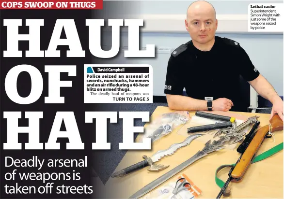 ??  ?? Lethal cache Superinten­dent Simon Wright with just some of the weapons seized by police