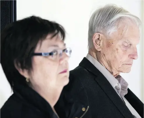  ?? LARS HAGBERG / THE CANADIAN PRESS ?? Donna and Doug French listen while their lawyer speaks to the media after Paul Bernardo’s parole was denied at Millhaven Institutio­n on Wednesday. Bernardo killed their teenage daughter Kristen.